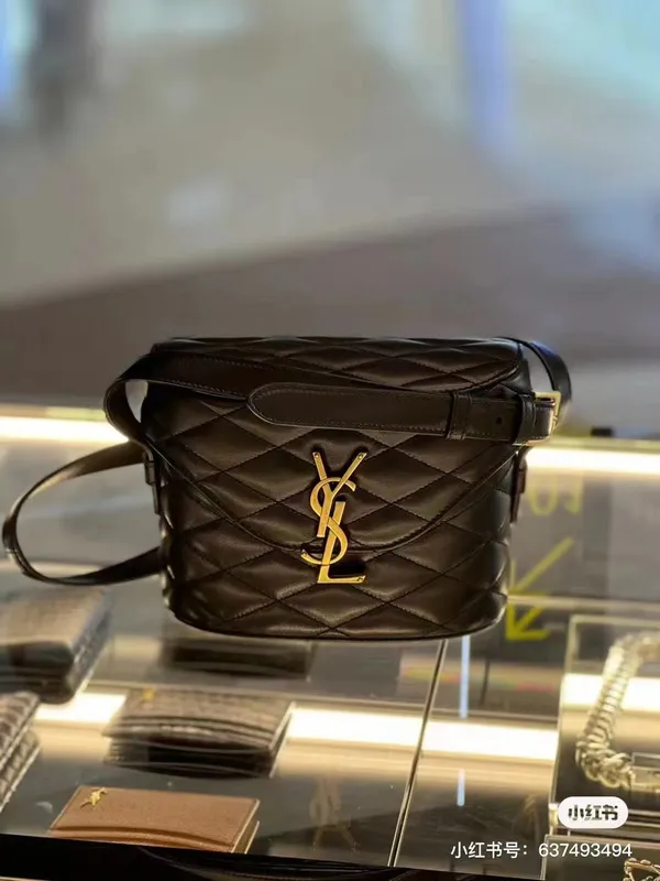 The 2023 New YSL Saint Laurent New JUNE Quilted Sheepskin Box Bag features  a front flip, shaped barrel design, and extremely compl… in 2023