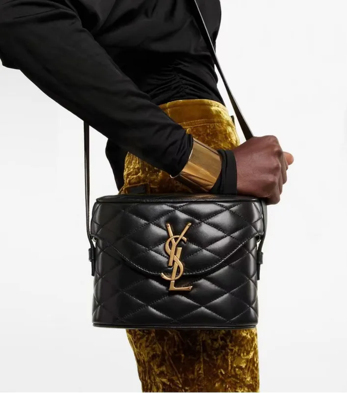 The 2023 New YSL Saint Laurent New JUNE Quilted Sheepskin Box Bag features  a front flip, shaped barrel design, and extremely compl… in 2023