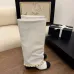 13Chanel Knee - High Boots: Diverse Textures, Gold Chains, a Showcase of Luxe Creativity #A54193