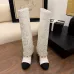 22Chanel Knee - High Boots: Diverse Textures, Gold Chains, a Showcase of Luxe Creativity #A54193