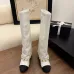 9Chanel Knee - High Boots: Diverse Textures, Gold Chains, a Showcase of Luxe Creativity #A54193