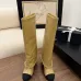 10Chanel Knee - High Boots: Diverse Textures, Gold Chains, a Showcase of Luxe Creativity #A54193